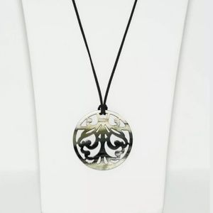 Handmade buffalo horn necklace.